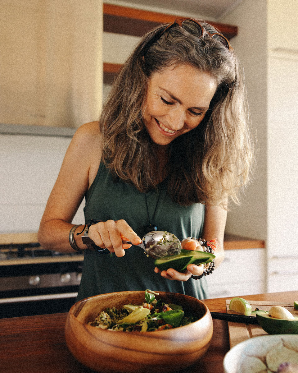Nutritionist preparing a fresh meal with avocado